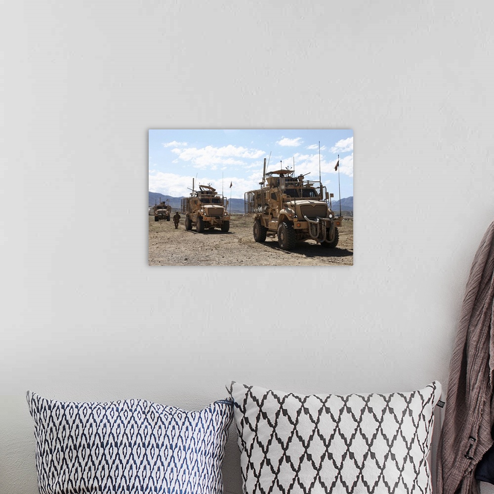 A bohemian room featuring May 12, 2012 - Three U.S. Army Mine Resistant Ambush Protected vehicles provide security during a...