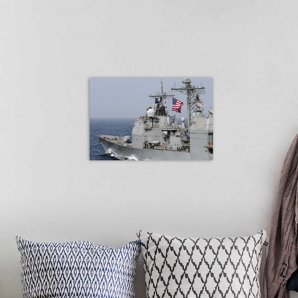 A bohemian room featuring Ticonderoga-class guided-missile cruiser USS Chancellorsville.