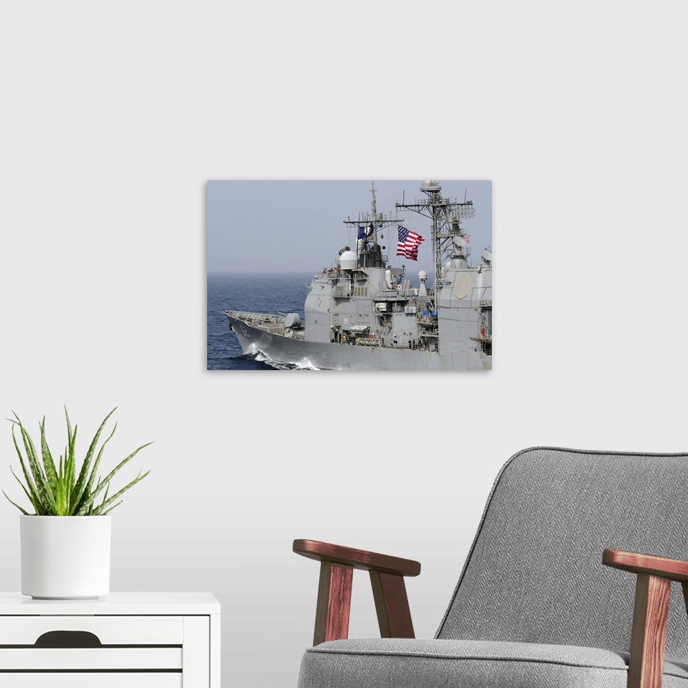A modern room featuring Ticonderoga-class guided-missile cruiser USS Chancellorsville.
