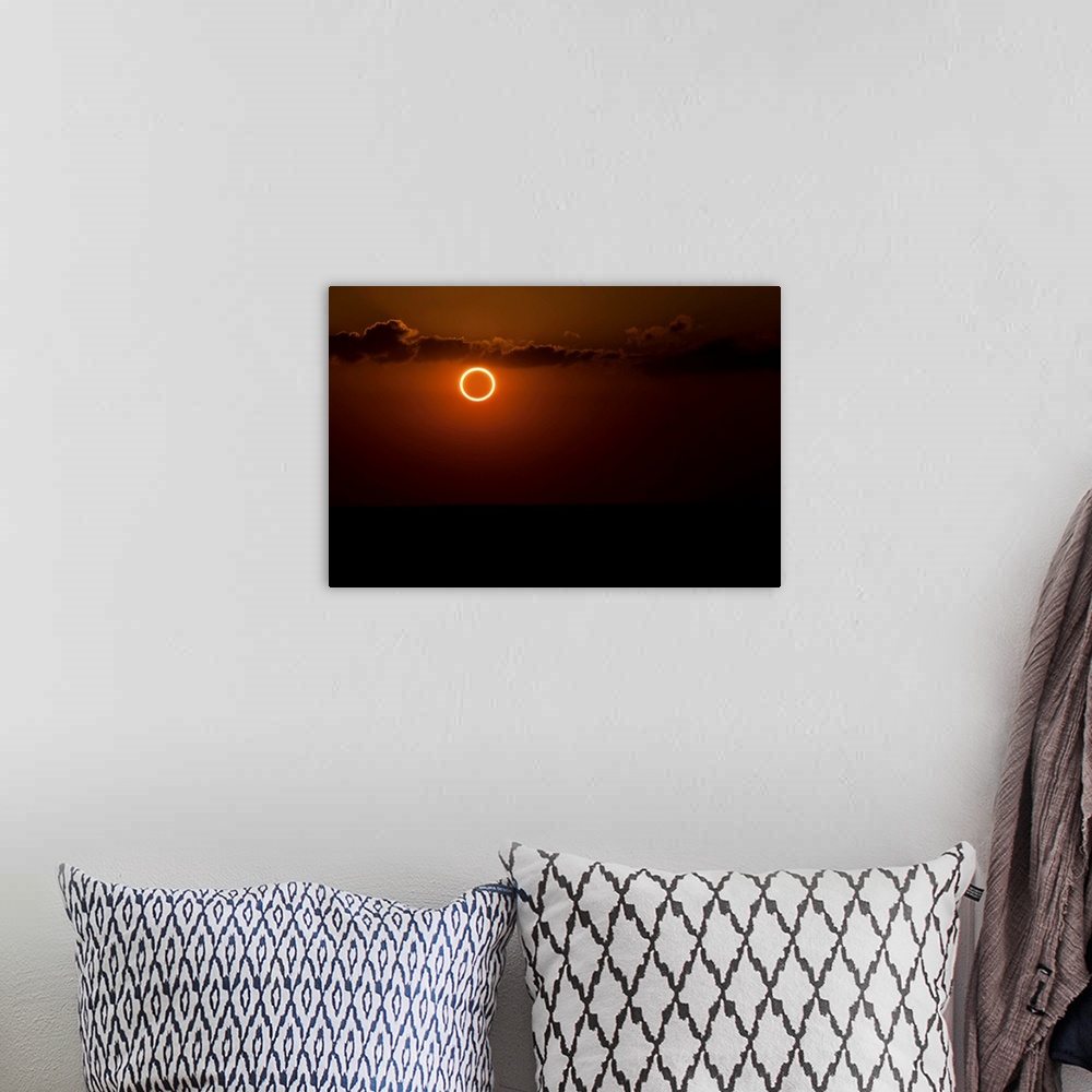 A bohemian room featuring Totality during annular solar eclipse with ring of fire.