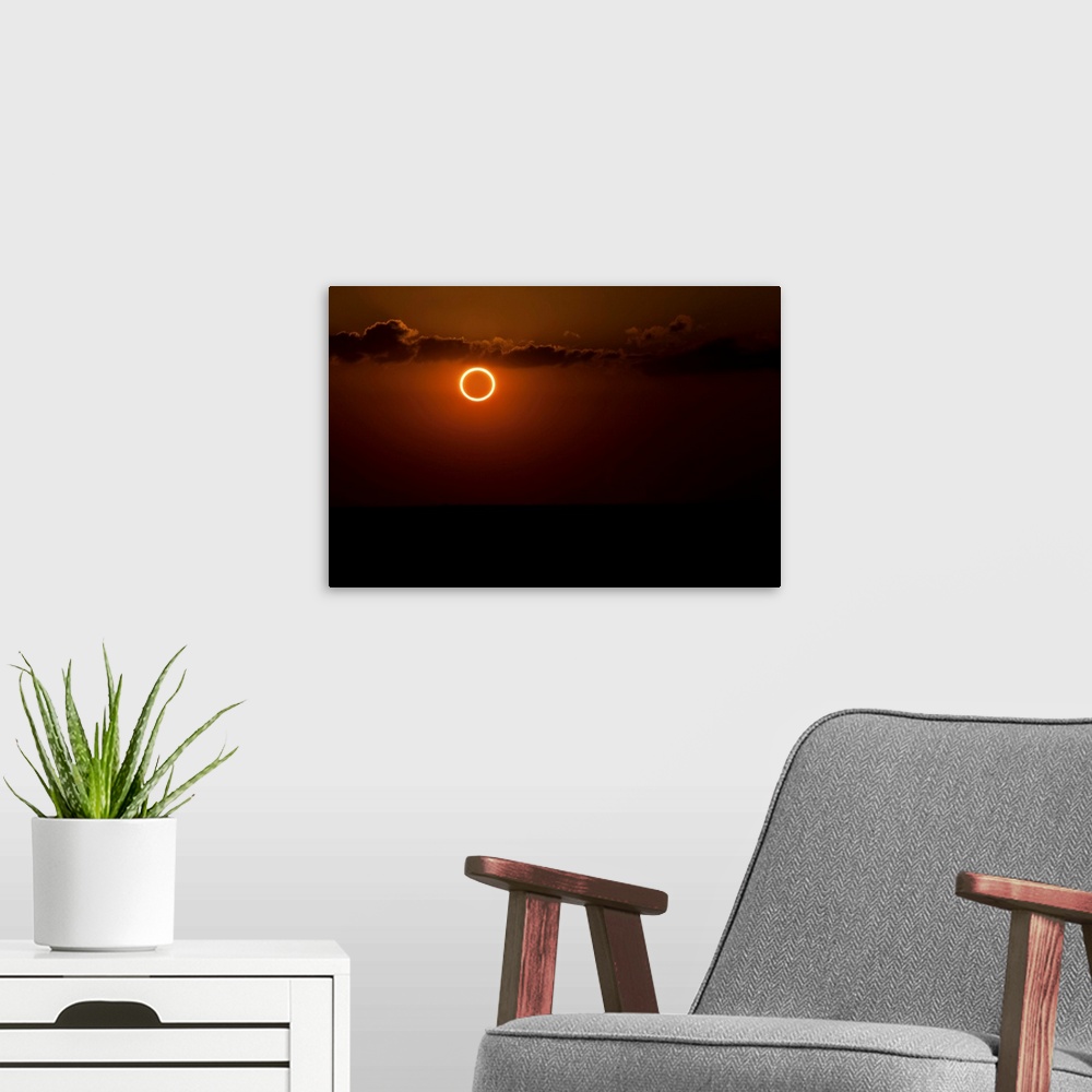 A modern room featuring Totality during annular solar eclipse with ring of fire.