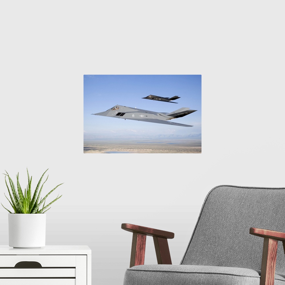 A modern room featuring Two F-117 Nighthawk stealth fighters fly on a training sortie out of of Holloman Air Force Base, ...
