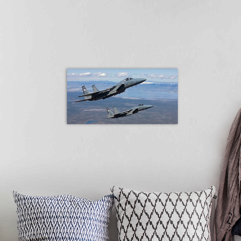 A bohemian room featuring Two F-15 Eagles from the 173rd Fighter Wing conduct air-to-air training over Central Oregon.