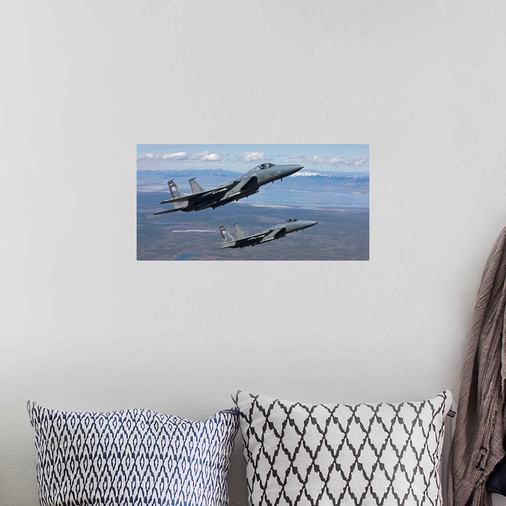 A bohemian room featuring Two F-15 Eagles from the 173rd Fighter Wing conduct air-to-air training over Central Oregon.