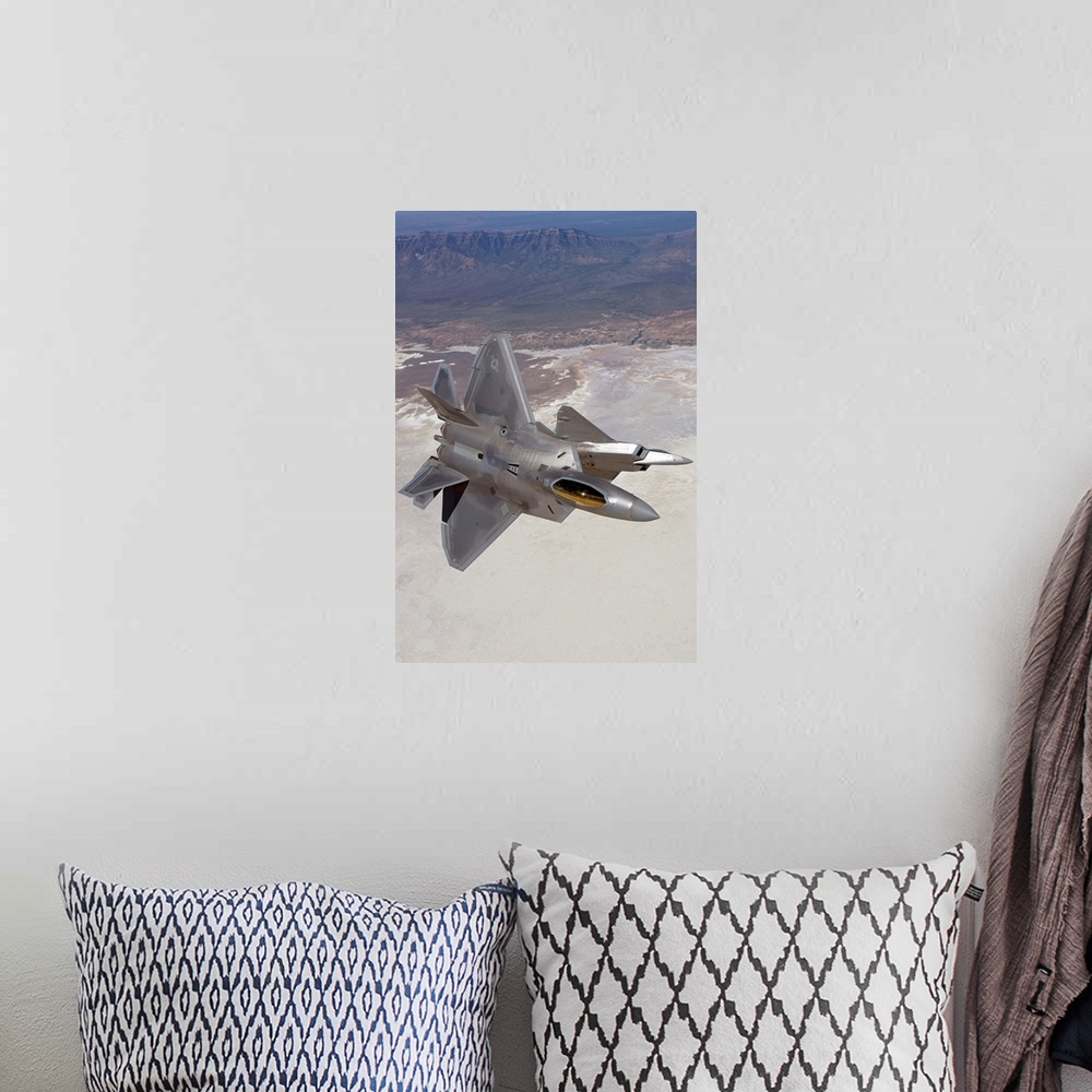 A bohemian room featuring Two F-22 Raptors from the 49th Fighter Wing manuever while on a training mission out of Holloman ...