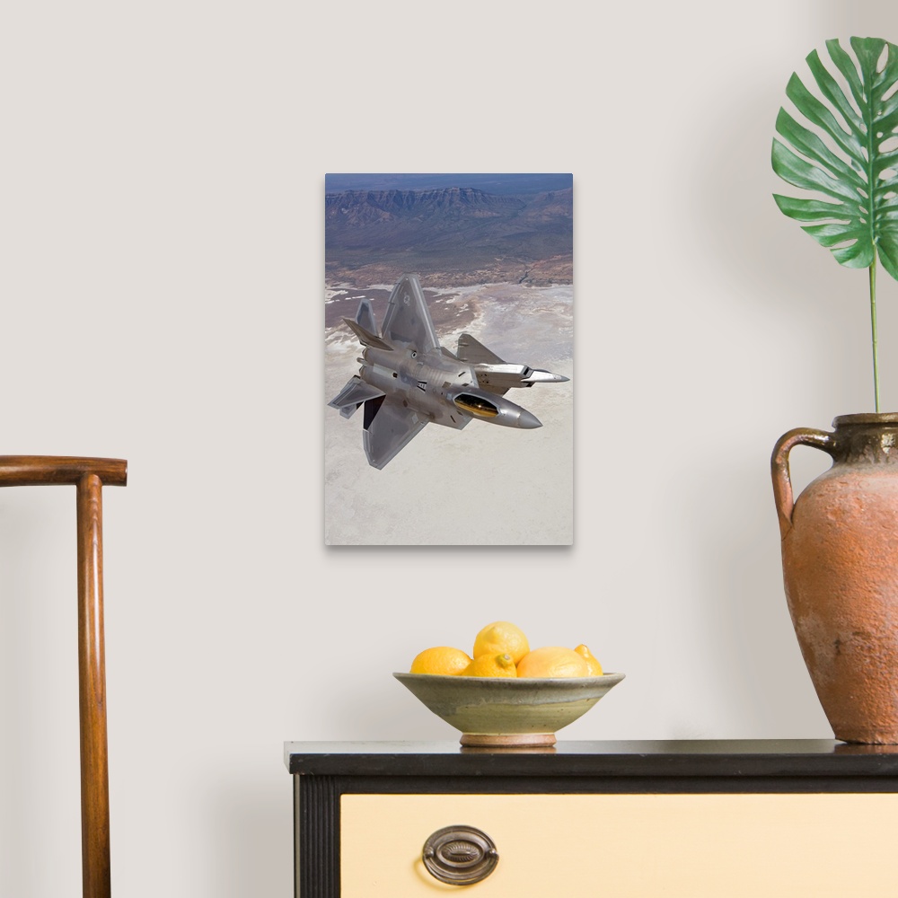 A traditional room featuring Two F-22 Raptors from the 49th Fighter Wing manuever while on a training mission out of Holloman ...