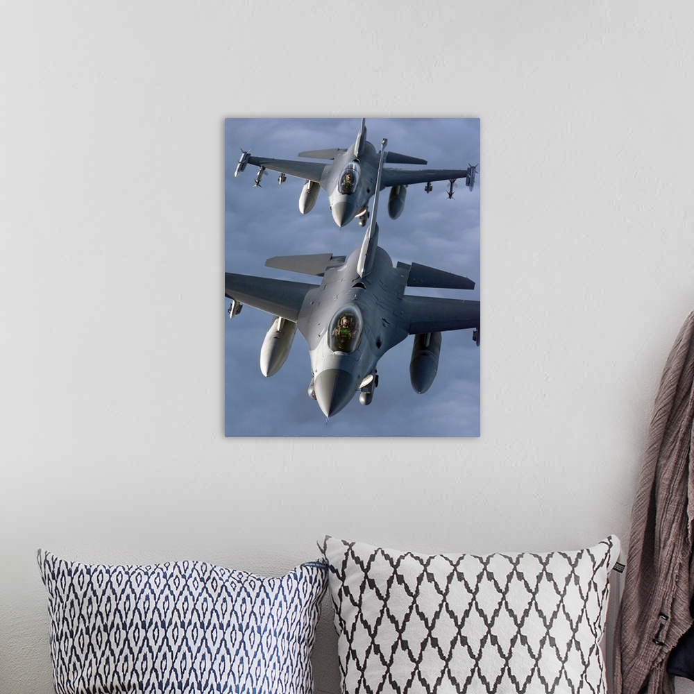 A bohemian room featuring Two F16 Fighting Falcons fly in formation