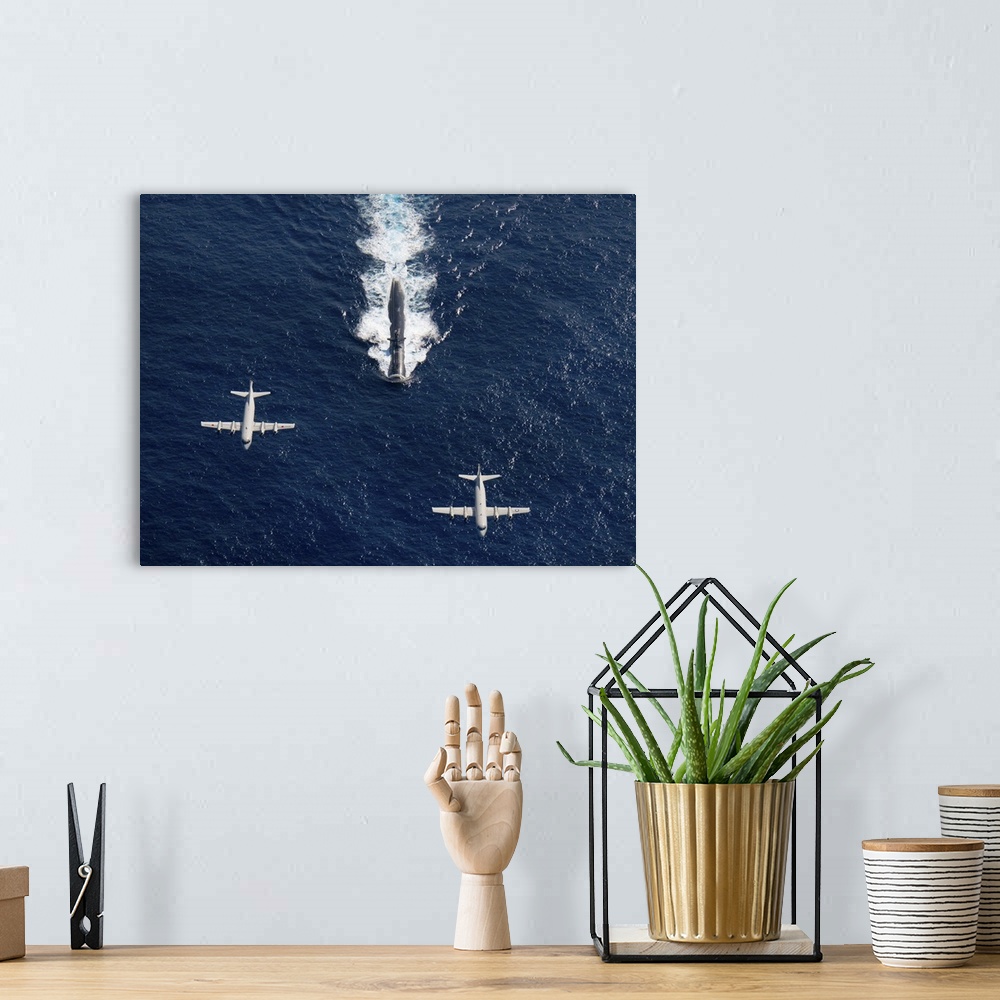 A bohemian room featuring December 10, 2010 - Two P-3 Orion anti-submarine and maritime surveillance aircraft from the Japa...