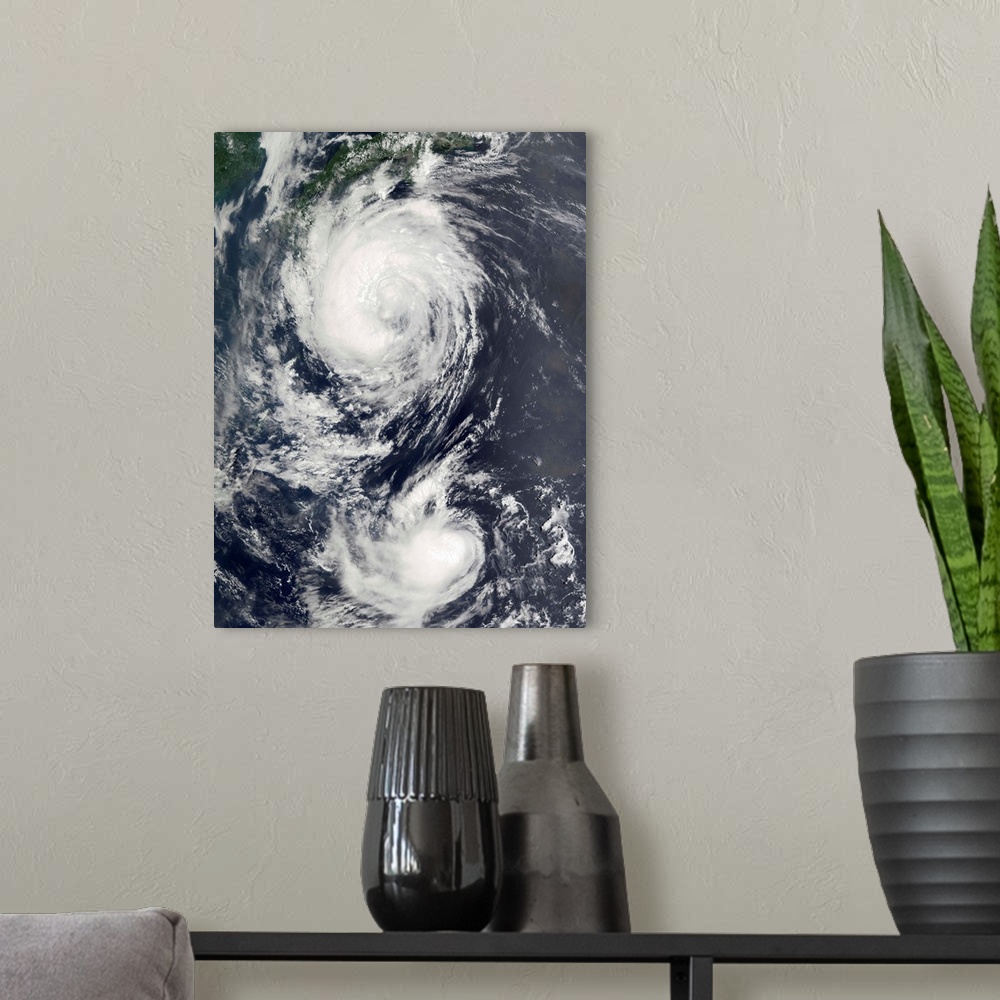 A modern room featuring Two Typhoon systems approaching the Far East