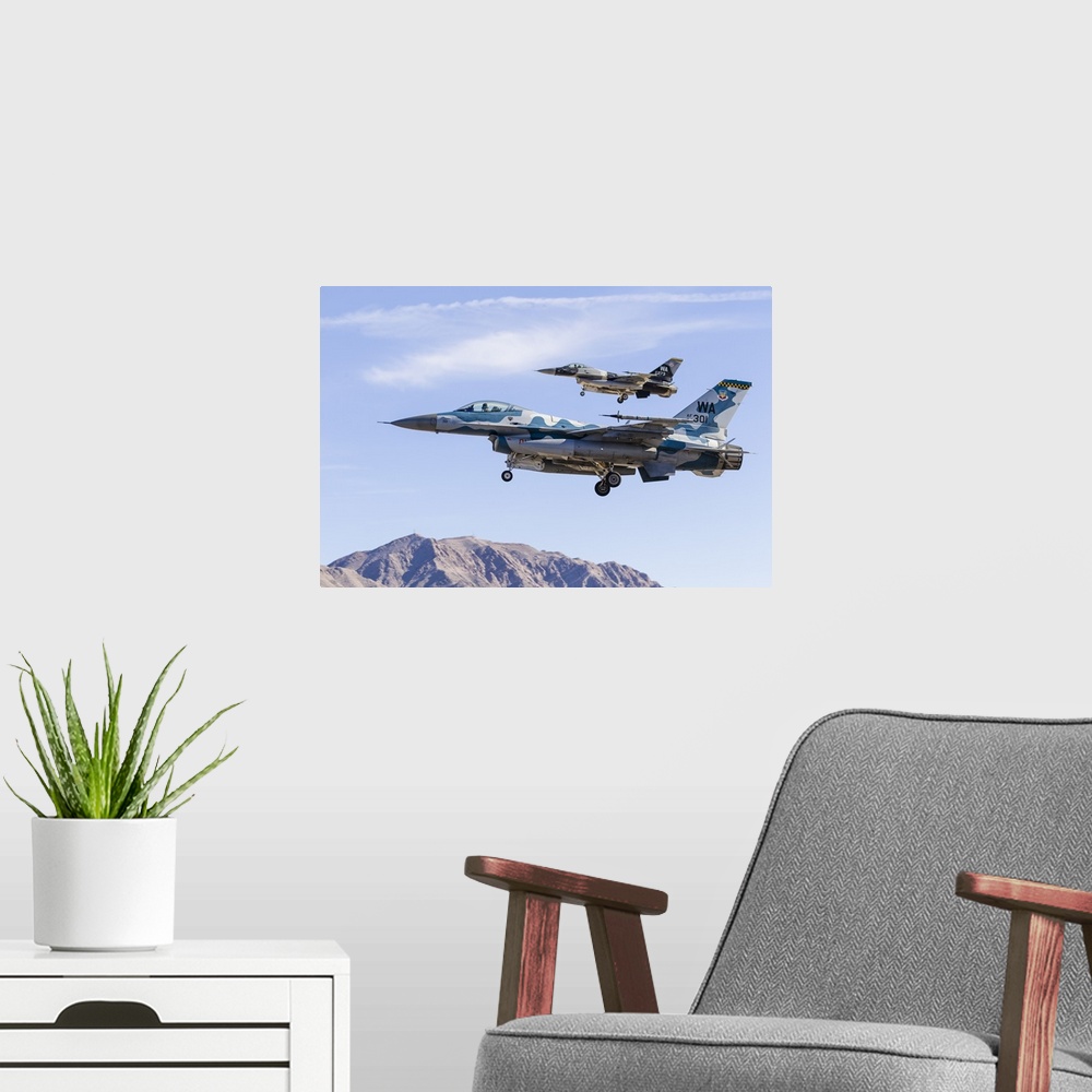 A modern room featuring Two U.S. Air Force F-16 Fighting Falcon aggressor aircraft on final approach.