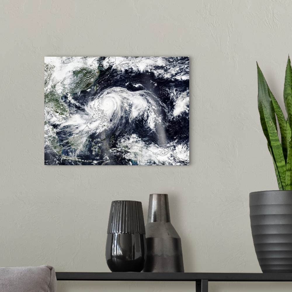 A modern room featuring Typhoon Mangkhut approaching the Philippines.