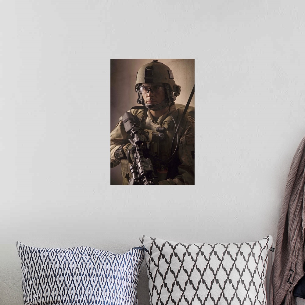 A bohemian room featuring U.S. Air Force CSAR parajumper armed with an automatic rifle.