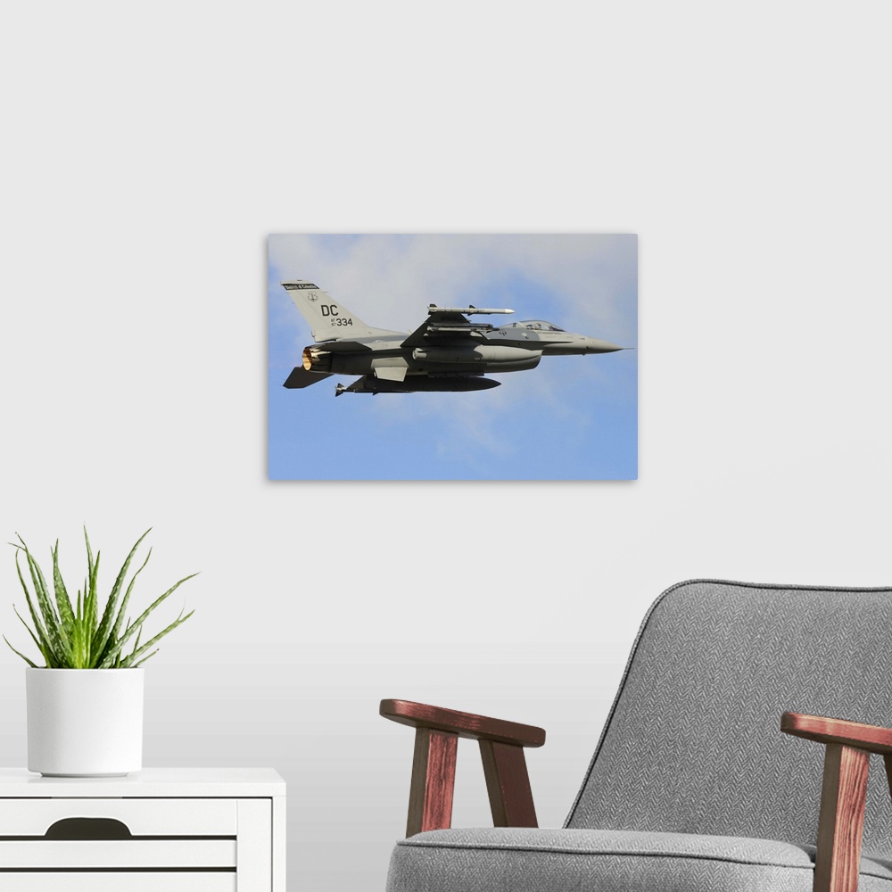 A modern room featuring U.S. Air Force F-16C from the 113th Wing District of Columbia Air National Guard taking off from ...