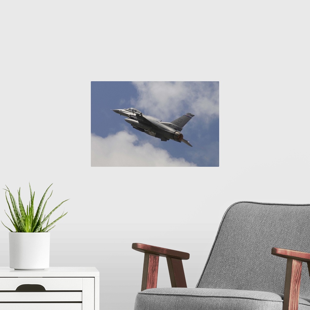 A modern room featuring U.S. Air Force F-16C from the 140th Fighter Wing  Colorado Air National Guard taking off from Nat...