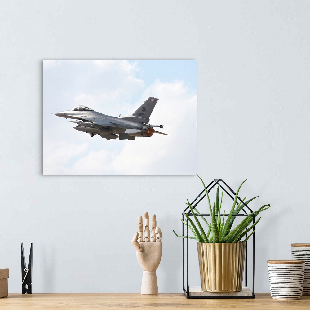 A bohemian room featuring U.S. Air Force F-16CM taking off from Ovda Air Base, Israel.