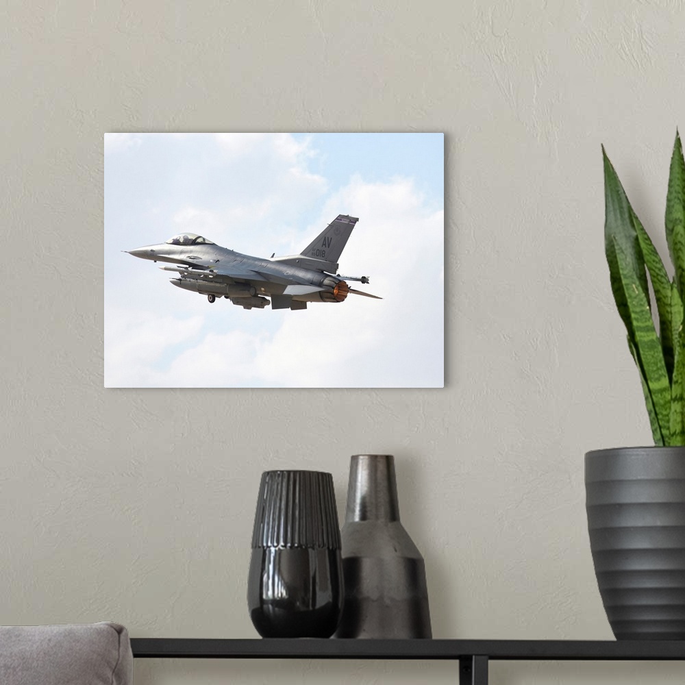 A modern room featuring U.S. Air Force F-16CM taking off from Ovda Air Base, Israel.