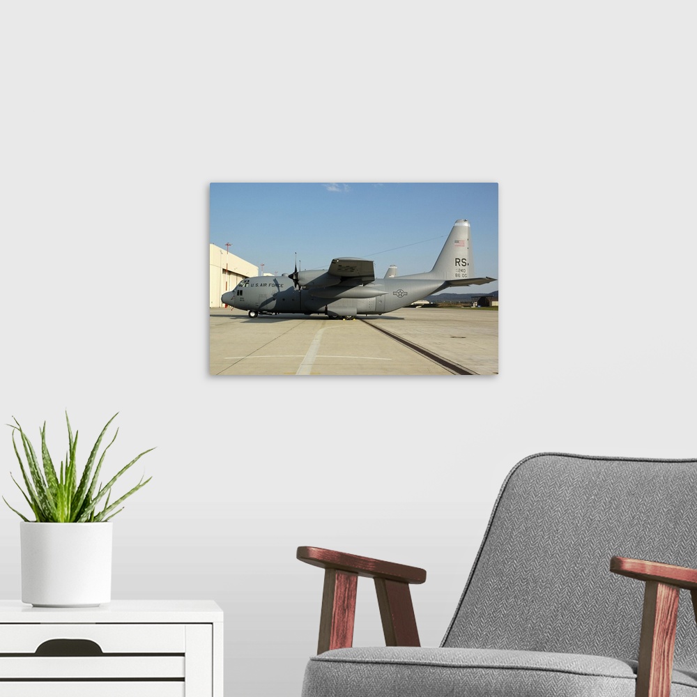 A modern room featuring U.S. Air Forces Europe (USAFE) C-130 Hercules at Ramstein Air Base, Germany.