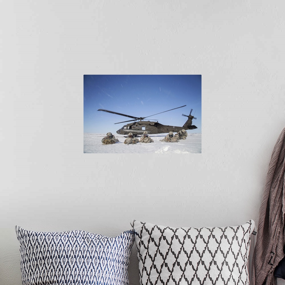 A bohemian room featuring May 2, 2014 - U.S. Army paratroopers pull security after exiting a UH-60 Black Hawk helicopter du...