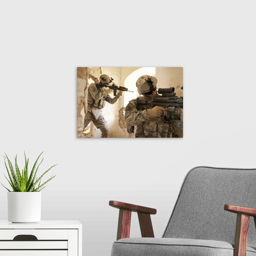 A modern room featuring U.S. Army Rangers in Afghanistan combat scene.