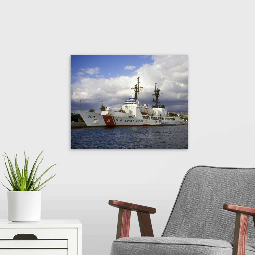 A modern room featuring This horizontal photograph is a coast guard ship based out of Hawaii that first launched in 1968 ...