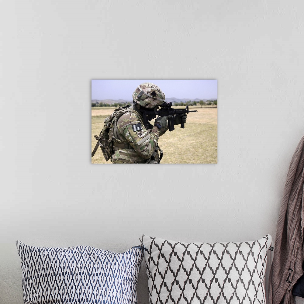 A bohemian room featuring June 6, 2013 - U.S. Army soldier pulls security in Khowst province, Afghanistan.