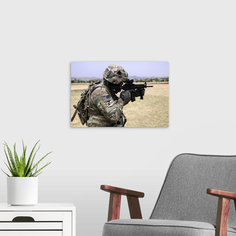 A modern room featuring June 6, 2013 - U.S. Army soldier pulls security in Khowst province, Afghanistan.