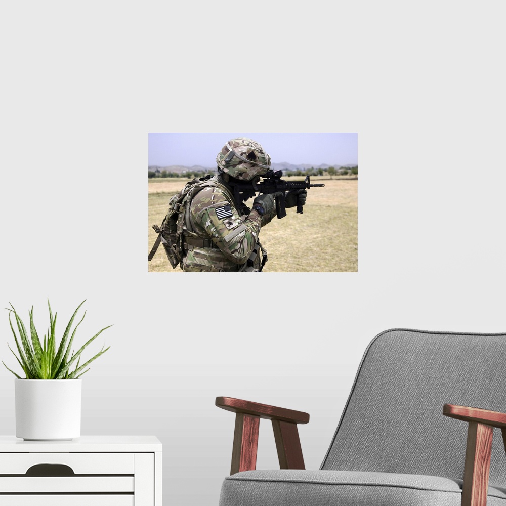 A modern room featuring June 6, 2013 - U.S. Army soldier pulls security in Khowst province, Afghanistan.