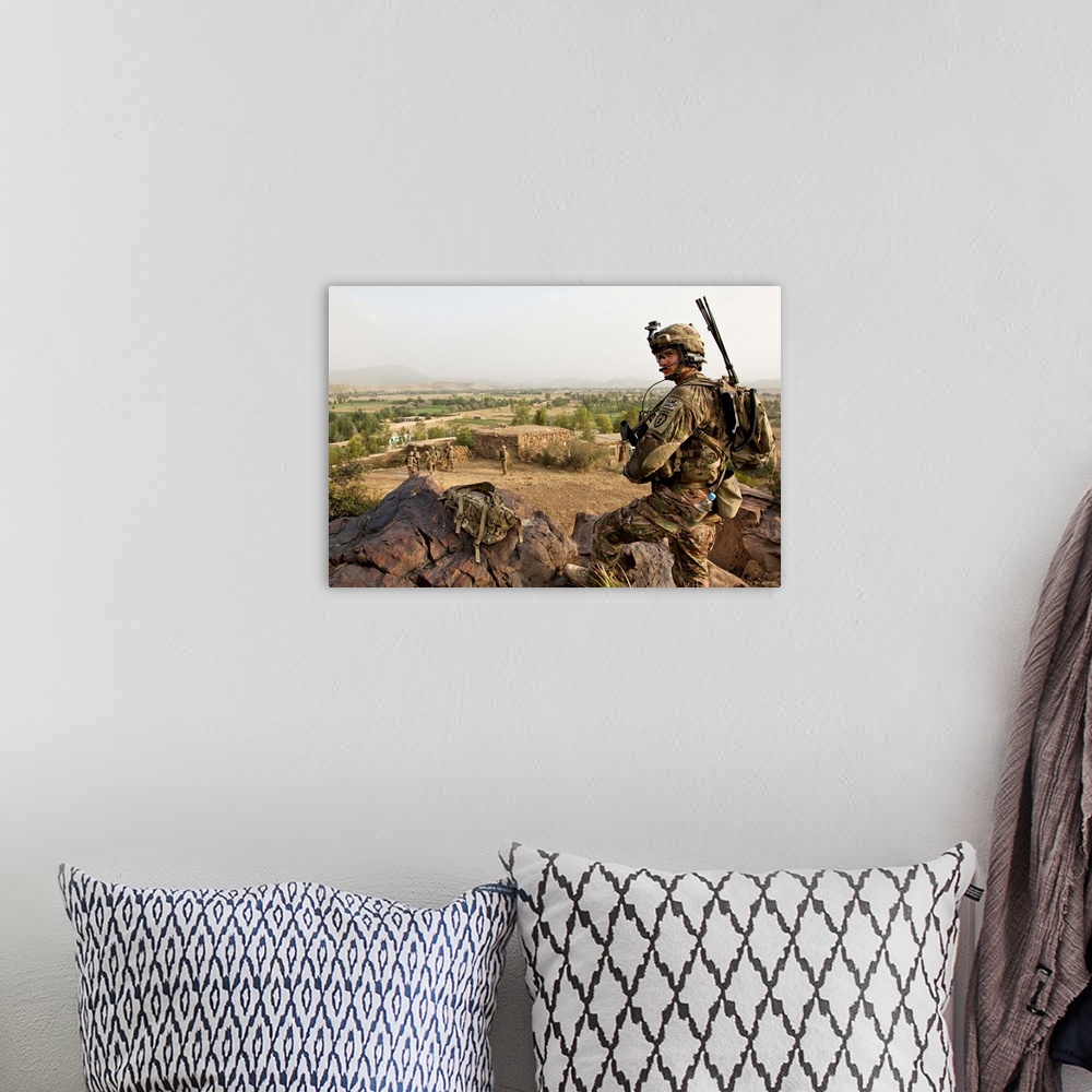 A bohemian room featuring U.S. Army Specialist provides security in Afghanistan.