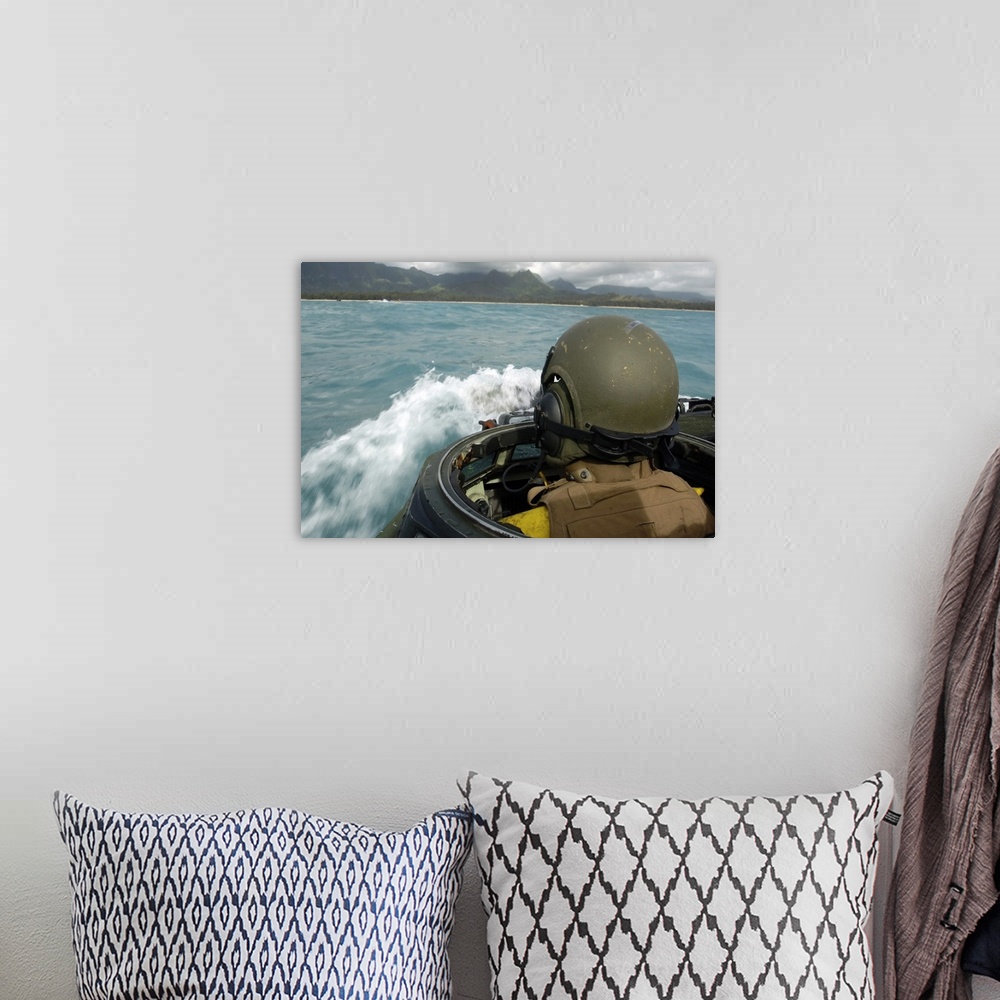 A bohemian room featuring US Marine driving an amphibious assault vehicle through the Pacific Ocean
