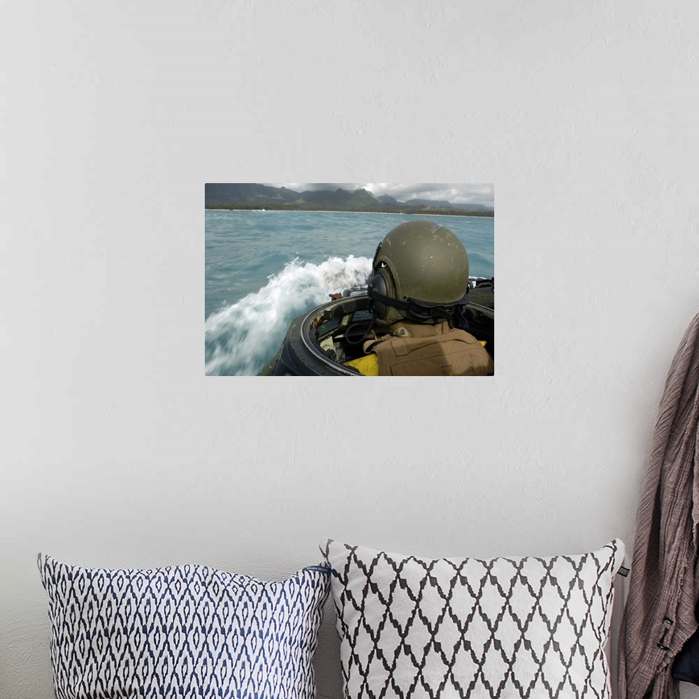 A bohemian room featuring US Marine driving an amphibious assault vehicle through the Pacific Ocean