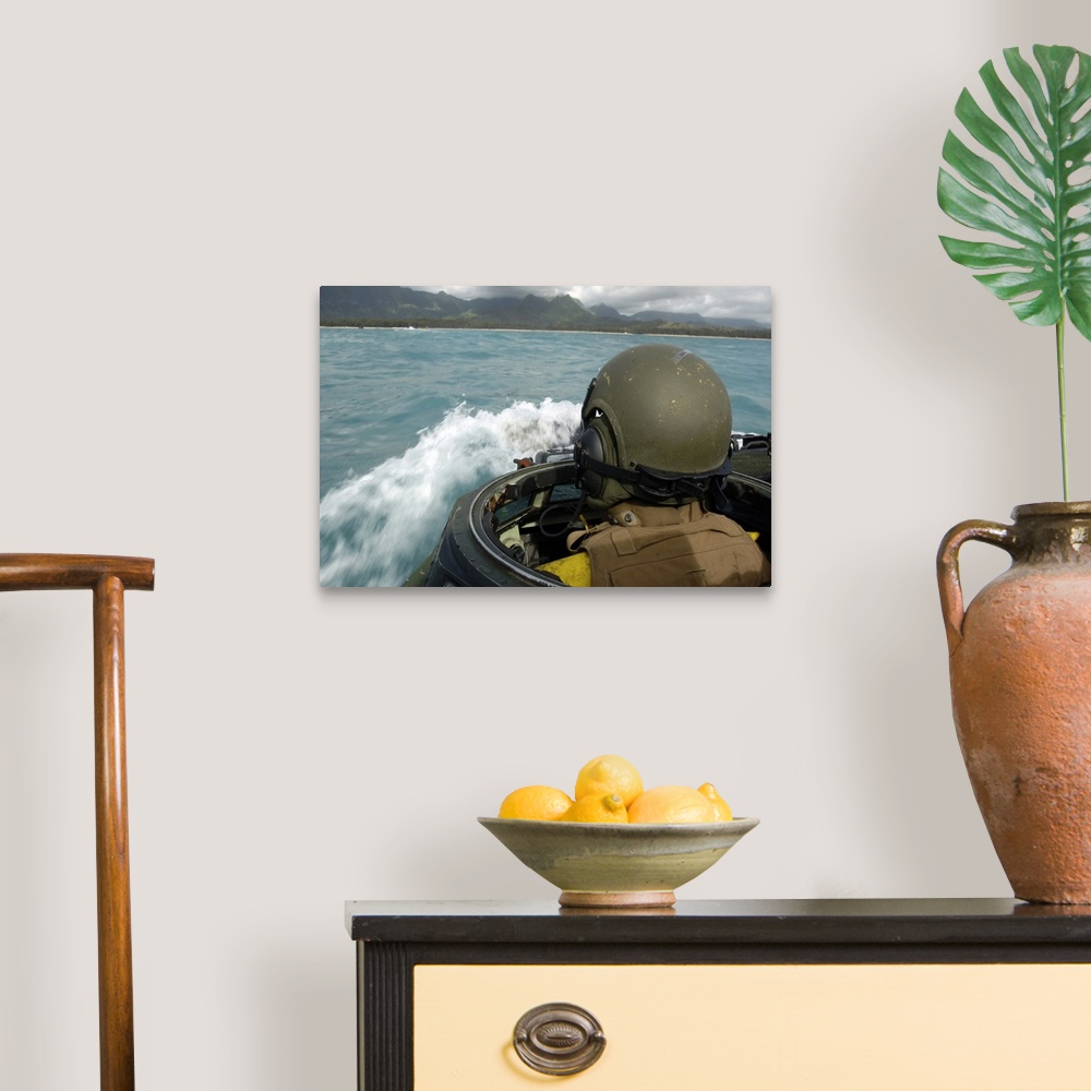 A traditional room featuring US Marine driving an amphibious assault vehicle through the Pacific Ocean