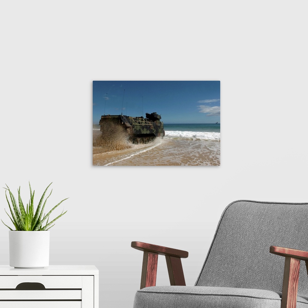 A modern room featuring US Marines drive an amphibious assault vehicle ashore