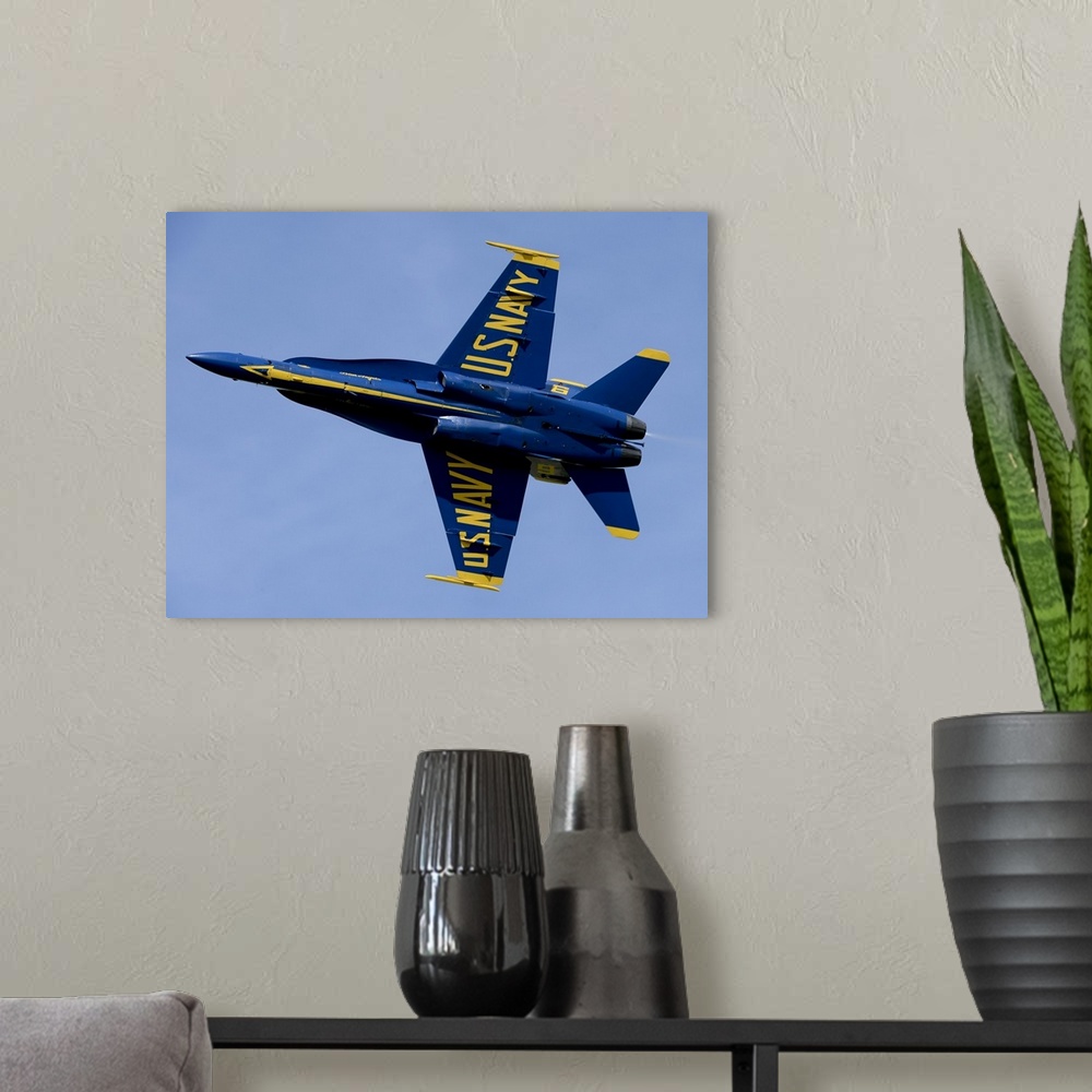 A modern room featuring March 6, 2014 - U.S. Navy flight demonstration squadron, the Blue Angels, flies in a practice dem...