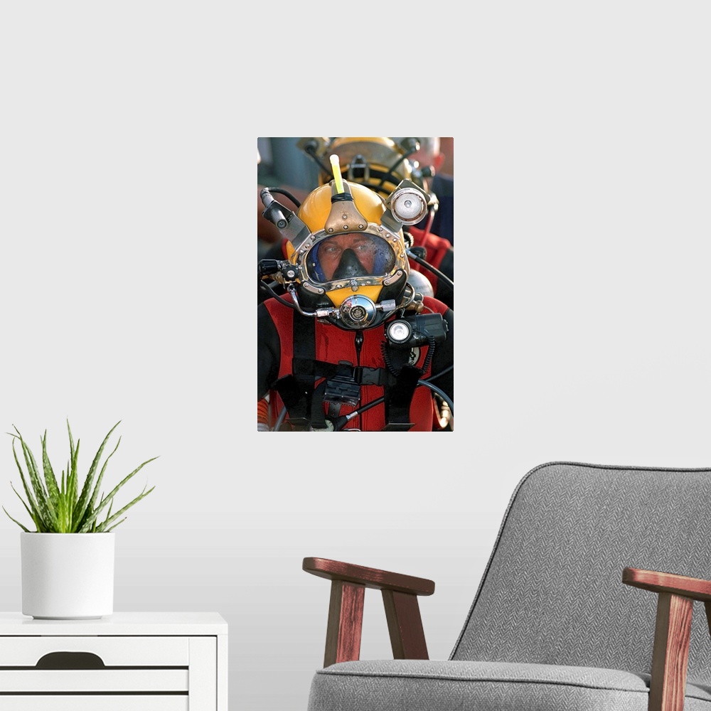 A modern room featuring US Navy Officer wears the MK21 Mod One diving helmet