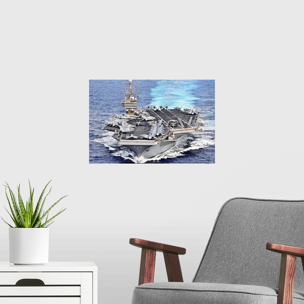 A modern room featuring December 16, 2011 - The Nimitz-class aircraft carrier USS Abraham Lincoln transits the Pacific Oc...