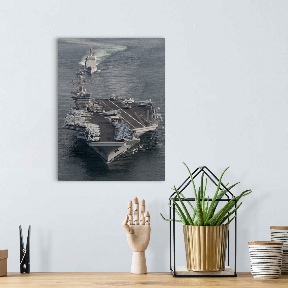 A bohemian room featuring USS Carl Vinson and USS Bunker Hill transit the Strait of Malacca.