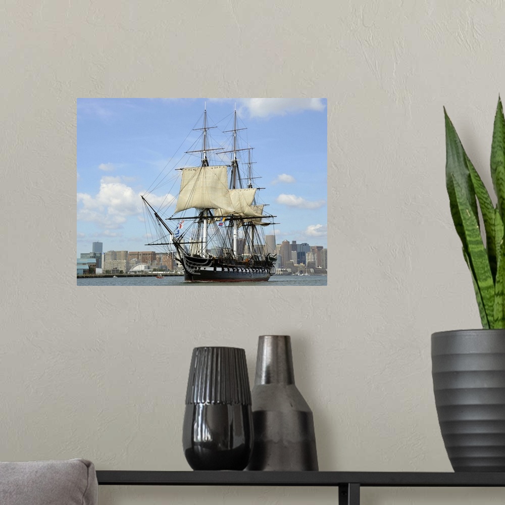A modern room featuring Boston, Massachusetts, August 23, 2013 - USS Constitution sets sail in Boston Harbor to commemora...