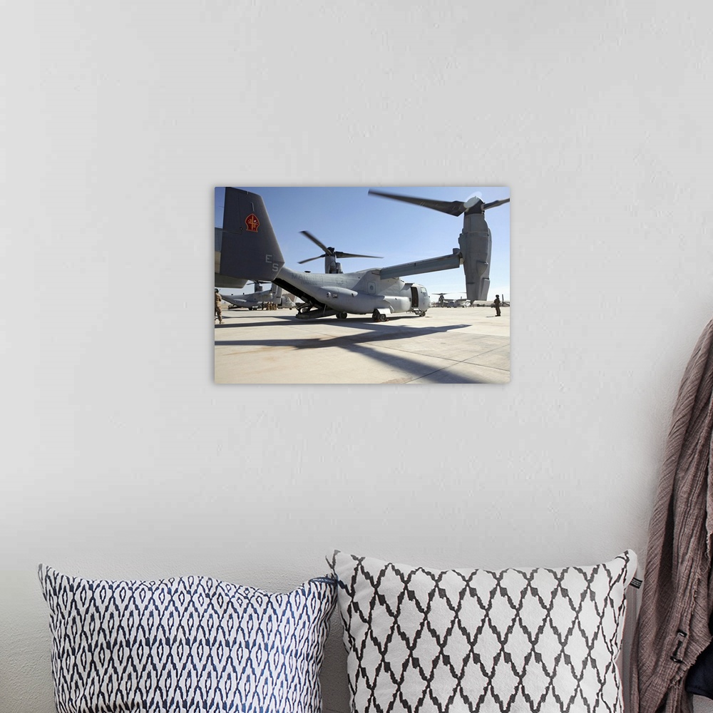 A bohemian room featuring January 15, 2011 - V-22 Osprey tiltrotor aircraft arrive at Camp Bastion, Afghanistan as an augme...