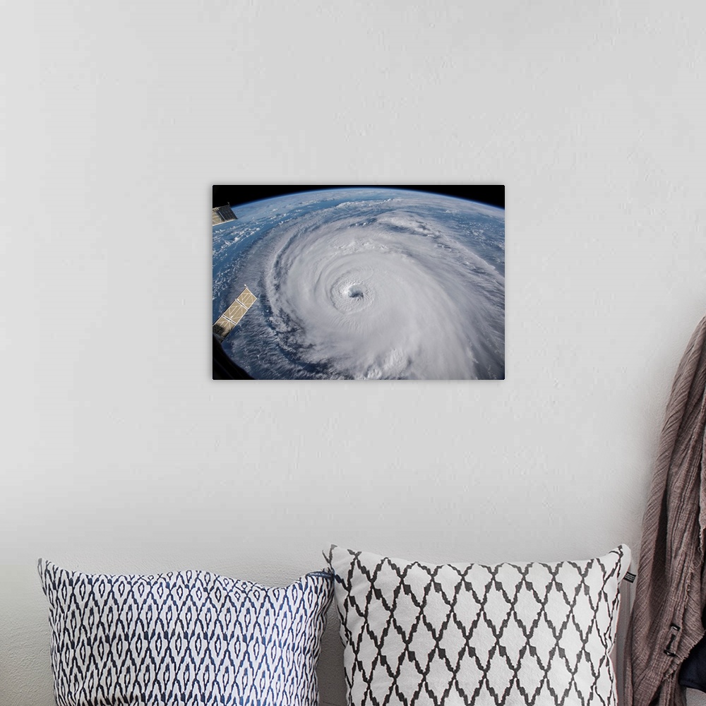 A bohemian room featuring View from space of Hurricane Florence in the Atlantic Ocean.