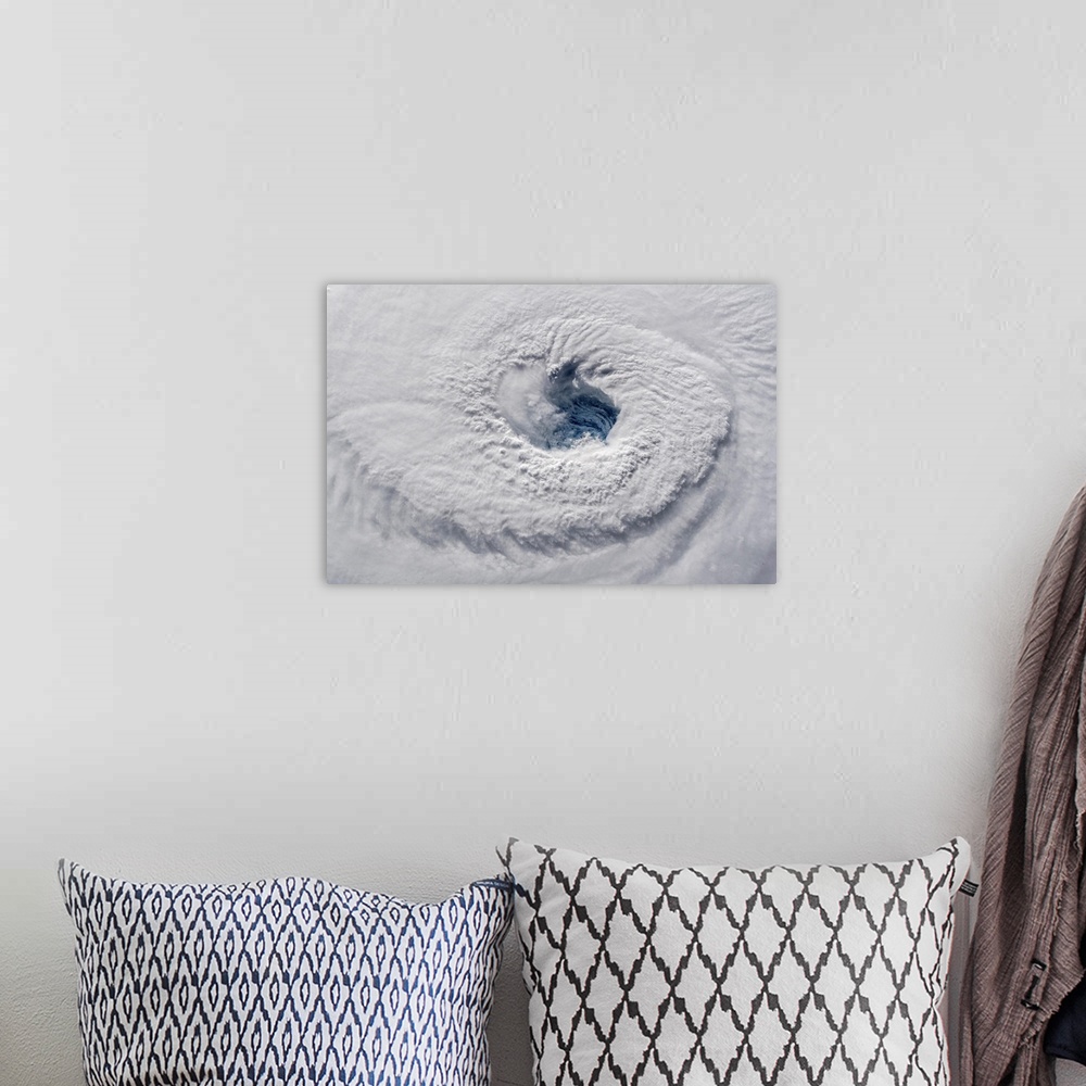 A bohemian room featuring View from space showing the eye of Hurricane Florence in the Atlantic Ocean.