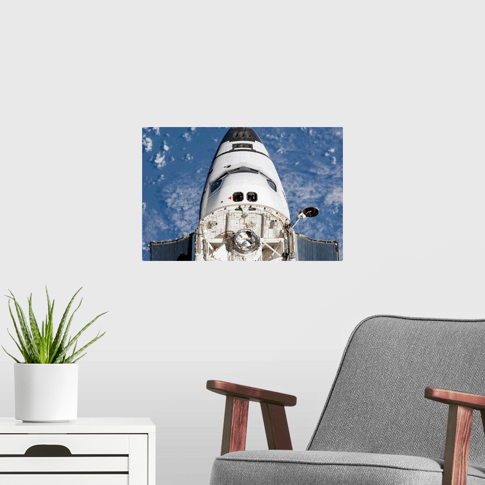 A modern room featuring View of space shuttle Endeavours crew cabin and forward payload bay