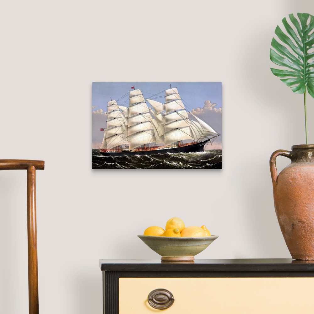 A traditional room featuring Vintage print of the Clipper ship Three Brothers.