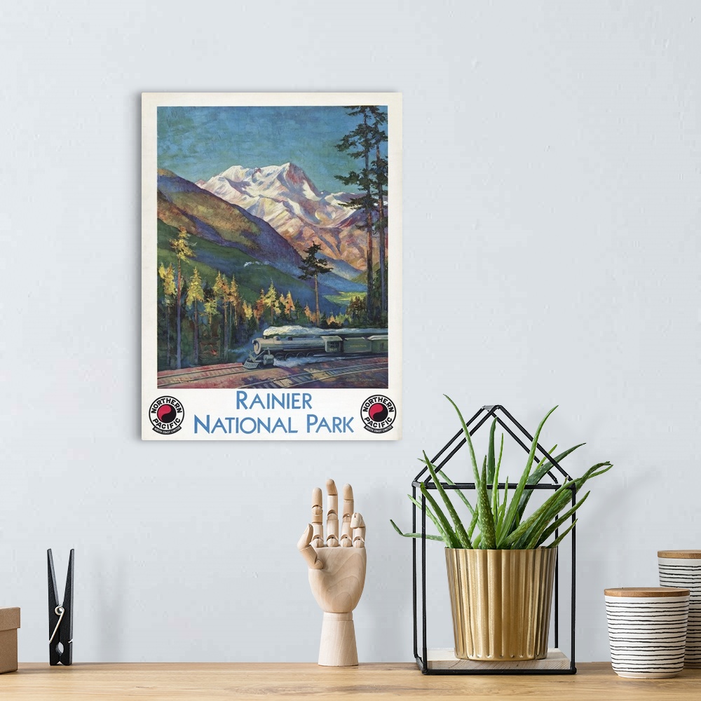 A bohemian room featuring Vintage travel poster for Rainier National Park, Northern Pacific North Coast Limited, 1920