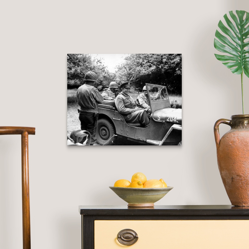 A traditional room featuring Vintage World War II photo of General Dwight D. Eisenhower sitting in a jeep talking with other o...