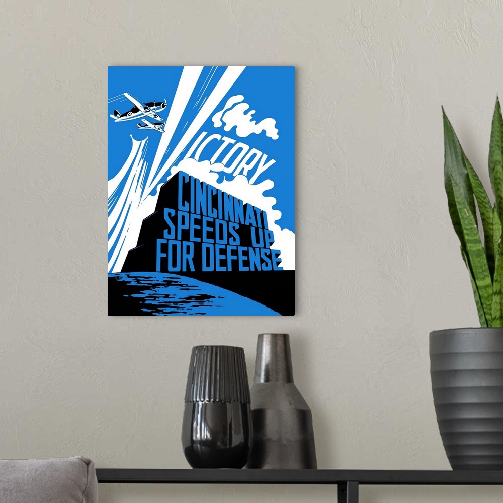 A modern room featuring Vintage World War II propaganda poster featuring two fighter planes flying over the ocean as the ...