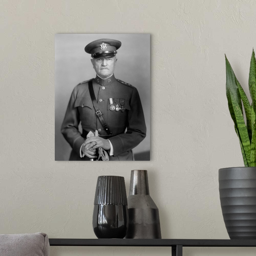 A modern room featuring Vintage World War One photo of General John J. Pershing.