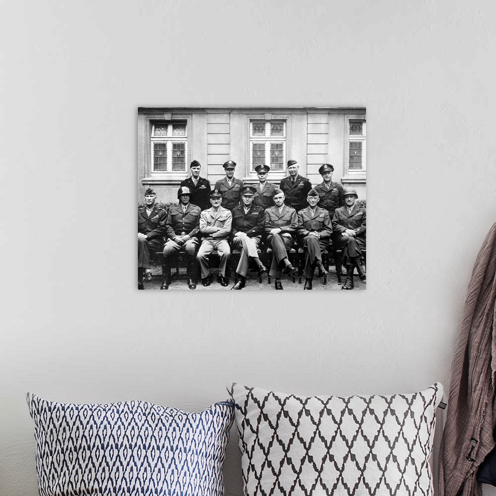A bohemian room featuring Digitally restored vintage World War II photo of the senior American military commanders of the E...