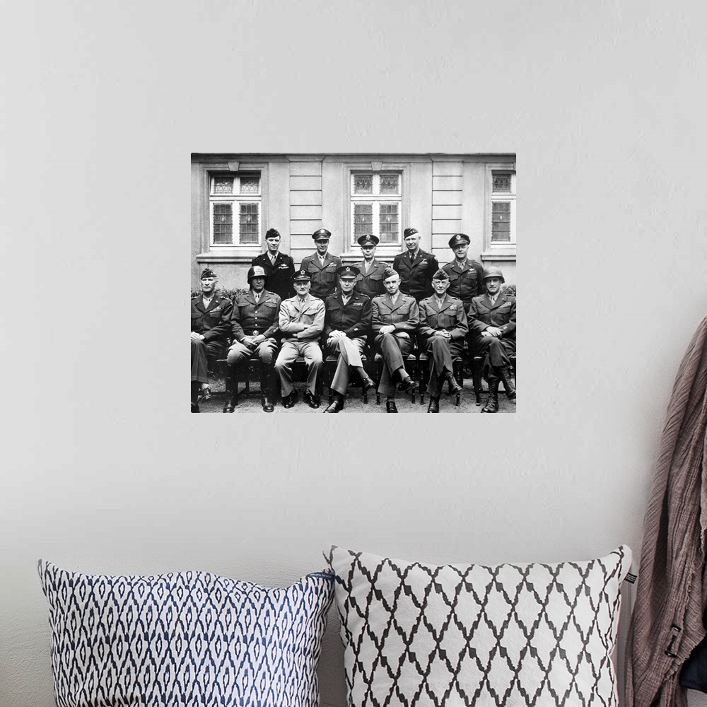 A bohemian room featuring Digitally restored vintage World War II photo of the senior American military commanders of the E...