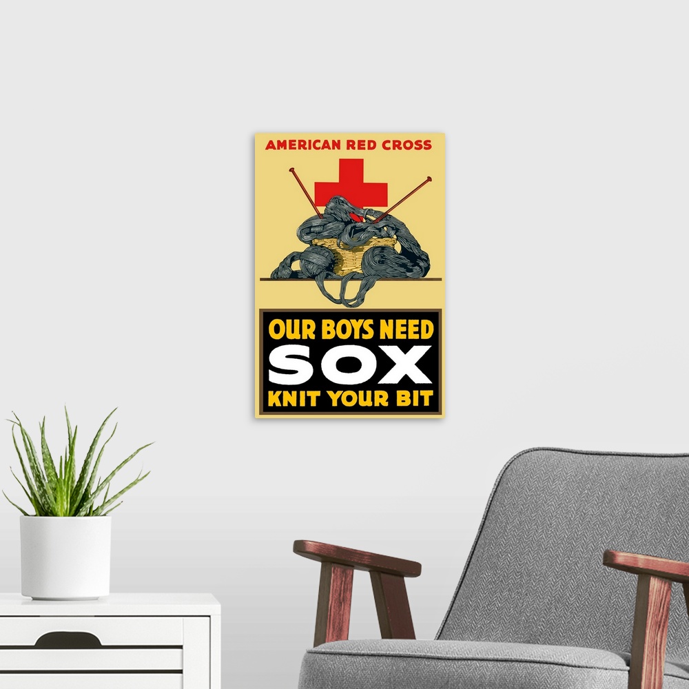 A modern room featuring Vintage World War One poster of a basket of yarn, two knitting needles, and a large red cross. It...