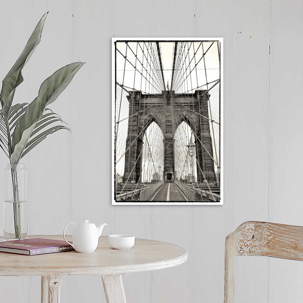 A farmhouse room featuring Black and white photograph of a dramatic view of the Brooklyn Bridge.